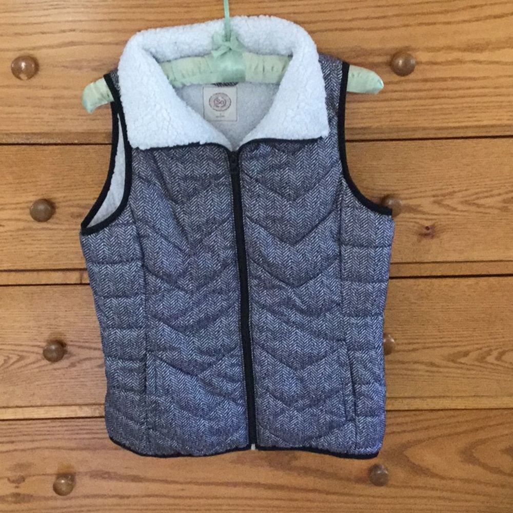 Black and white lined vest